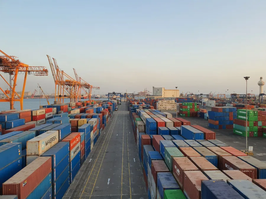 Aerial view of a container port with rows of stacked containers